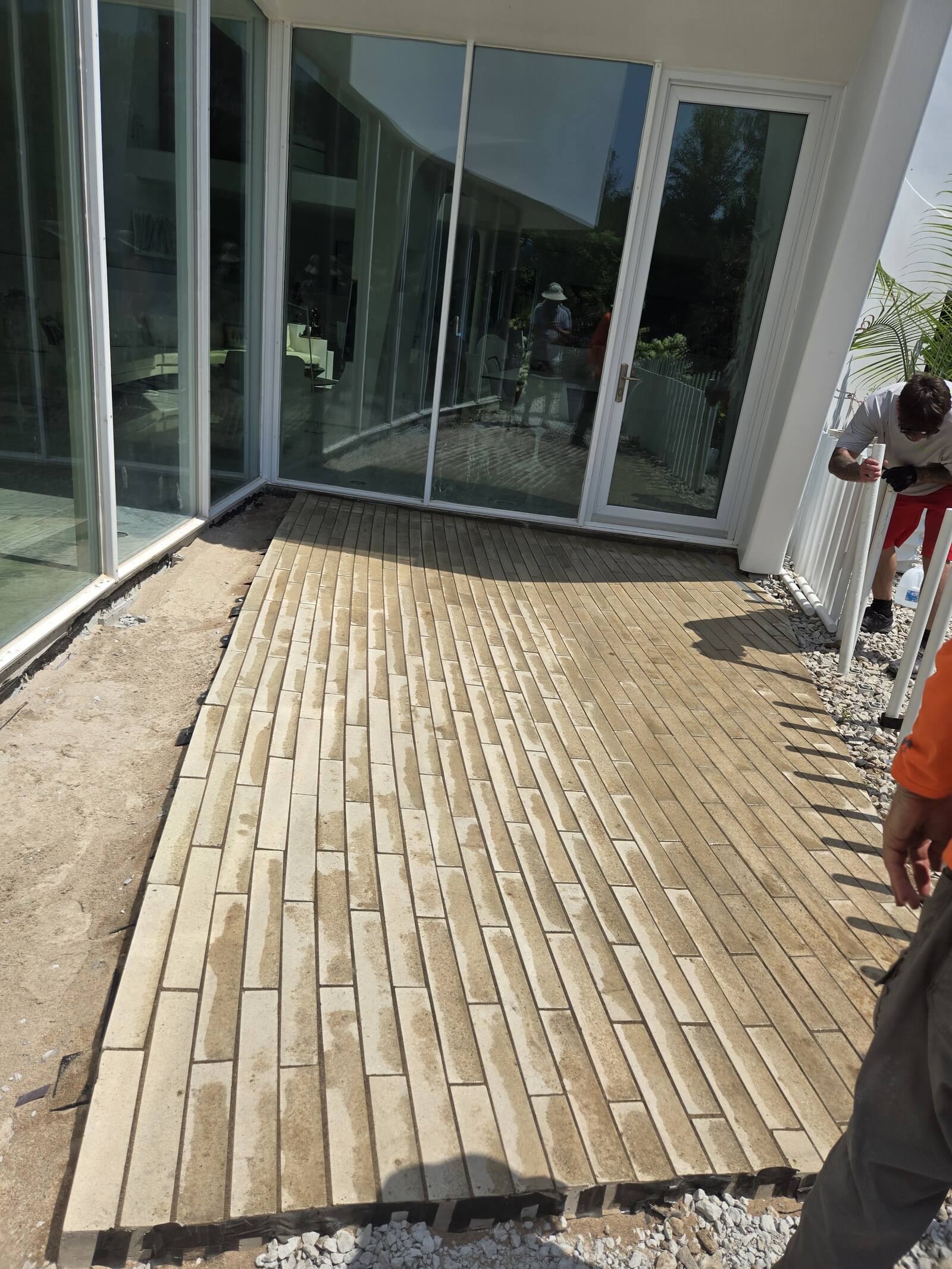 Brick paver patio installation in progress