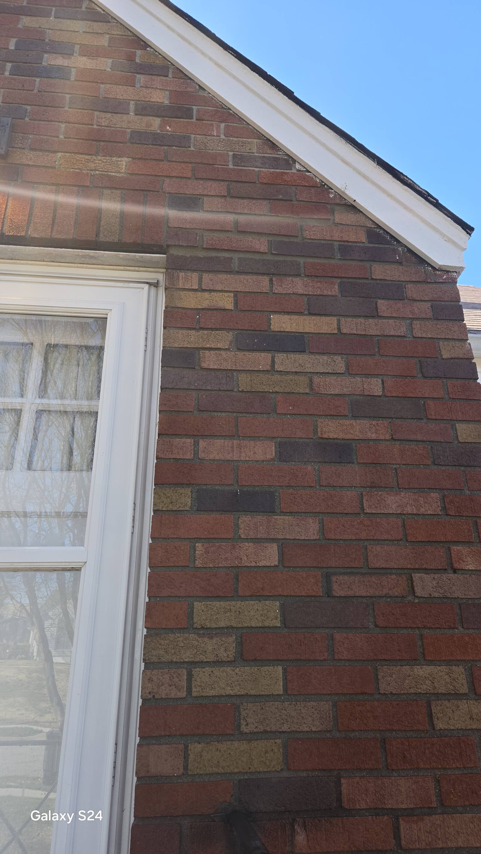 Freshly repointed mortar joints on an Omaha brick wall
