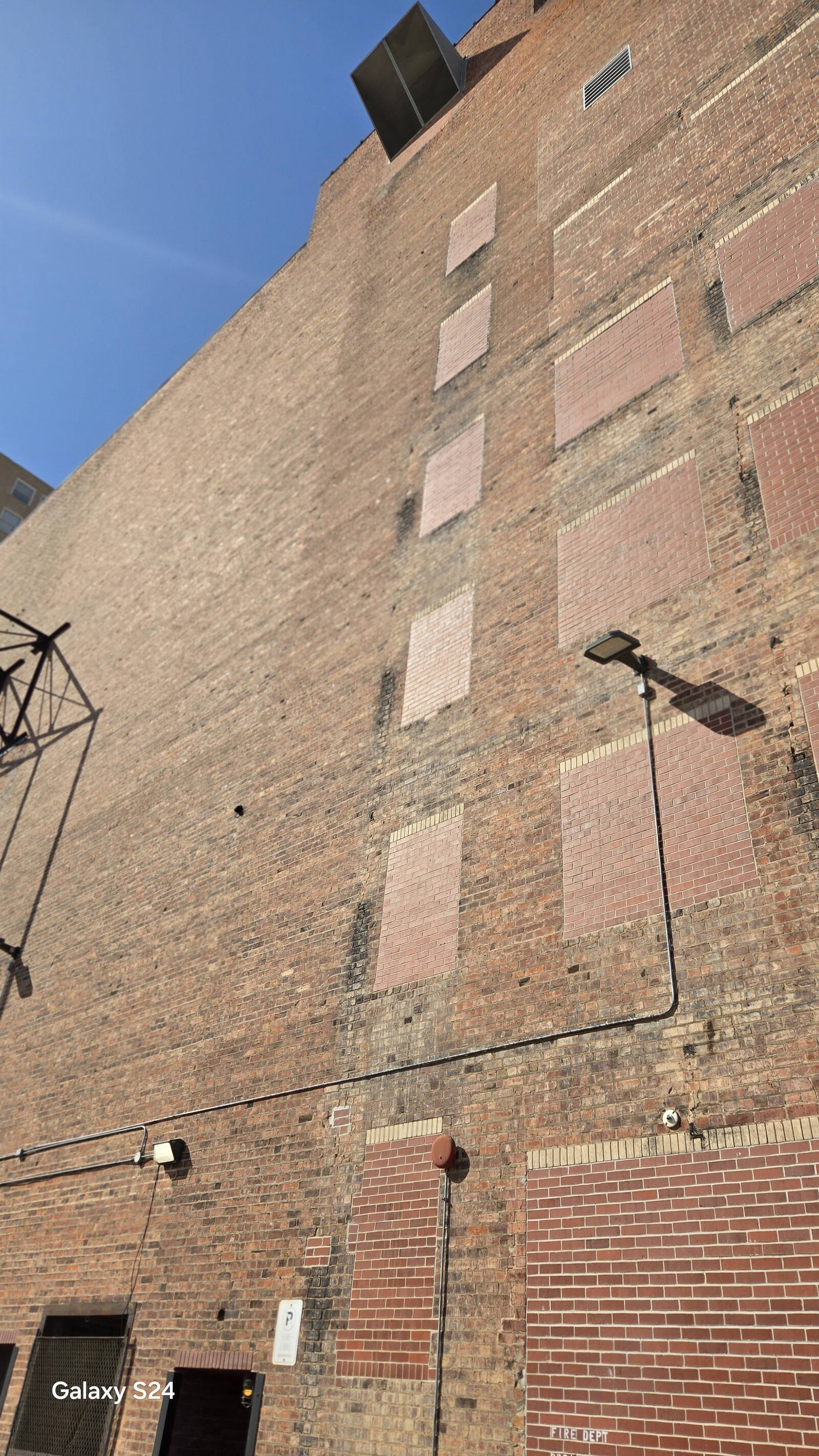 Commercial brick building wall during restoration