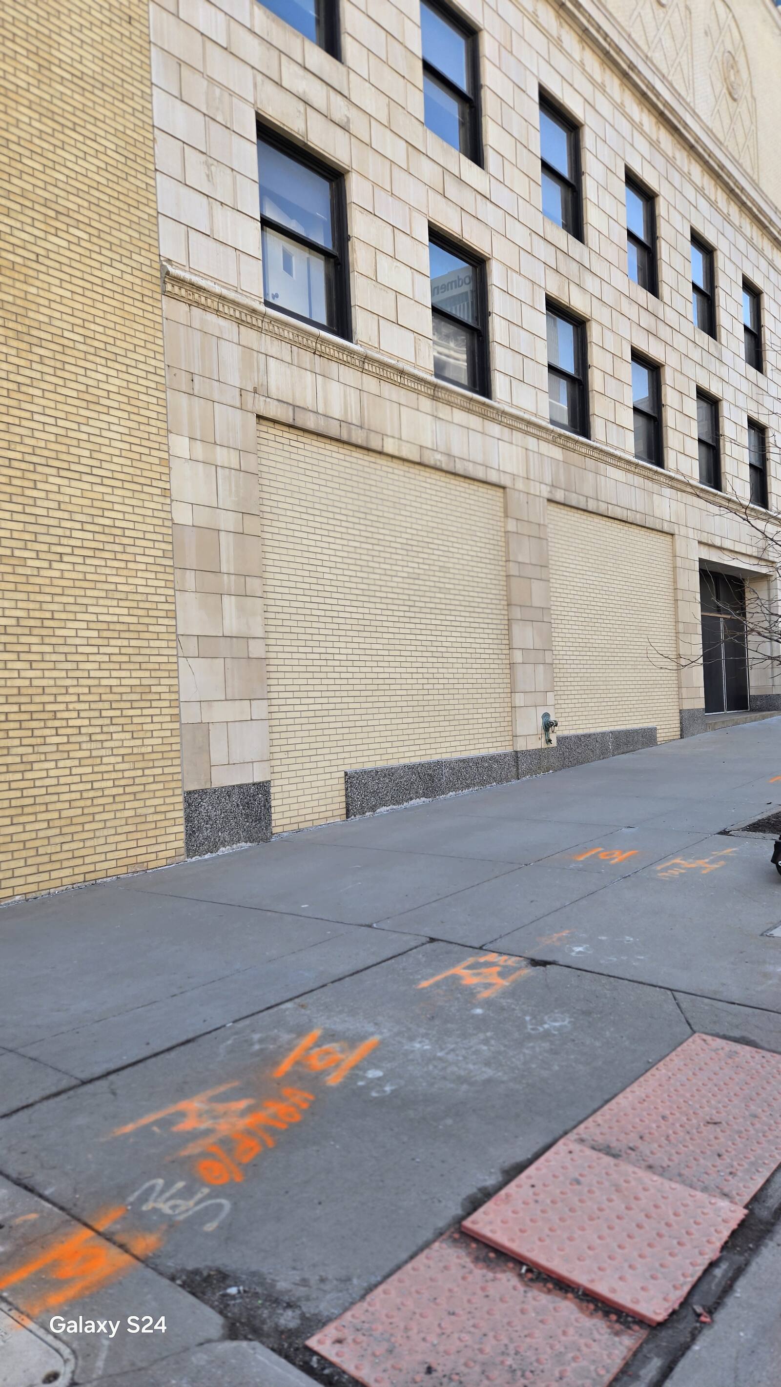 Commercial masonry restoration work in an Omaha district